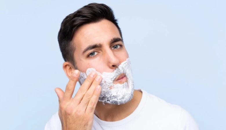 shave with razor.